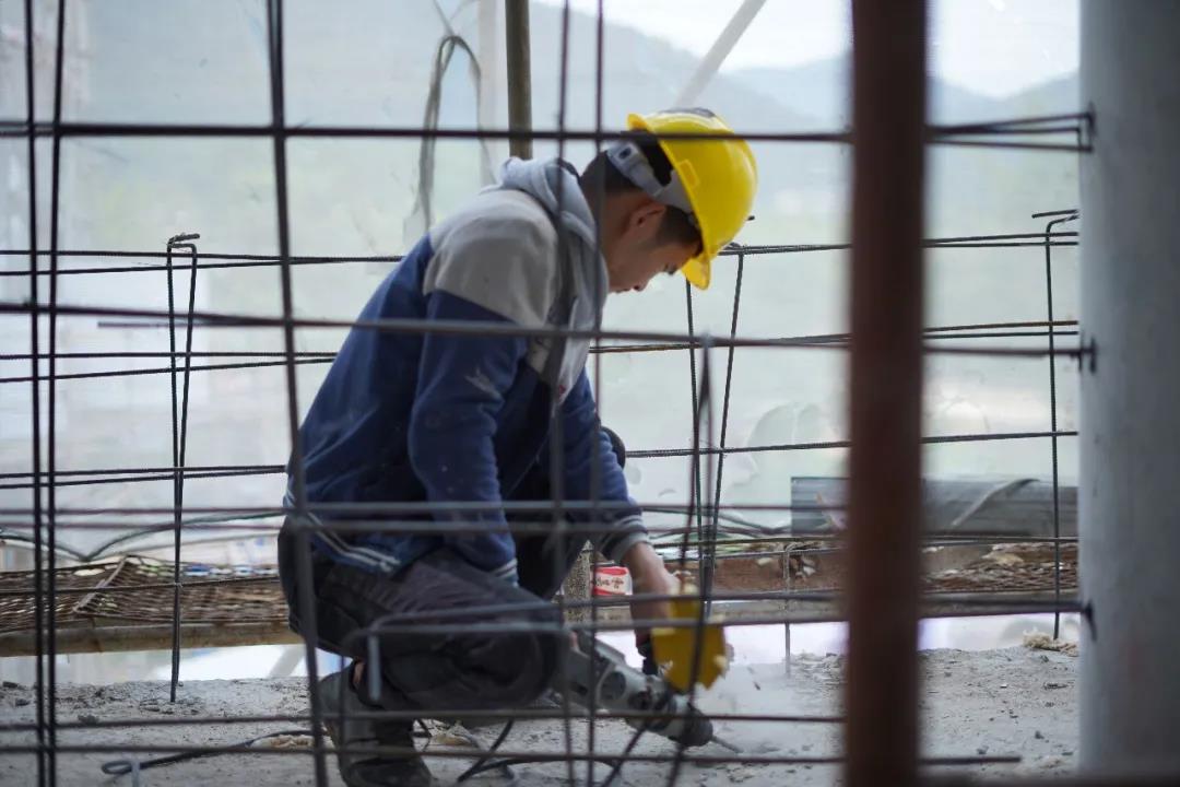 Laying the foundation and fixing the steel bars