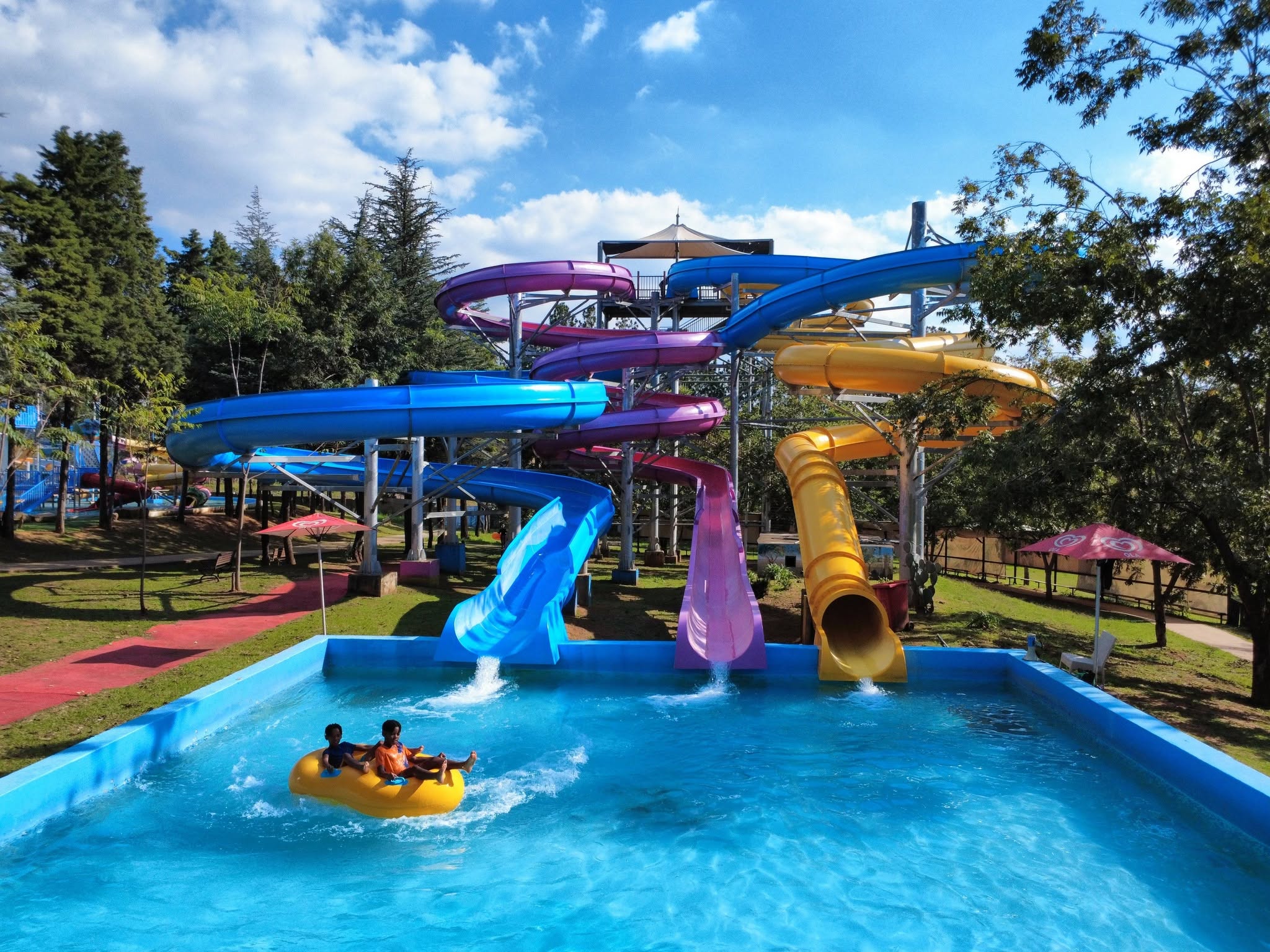 Open and enclosed spiral slide combination at Happy Island Waterworld