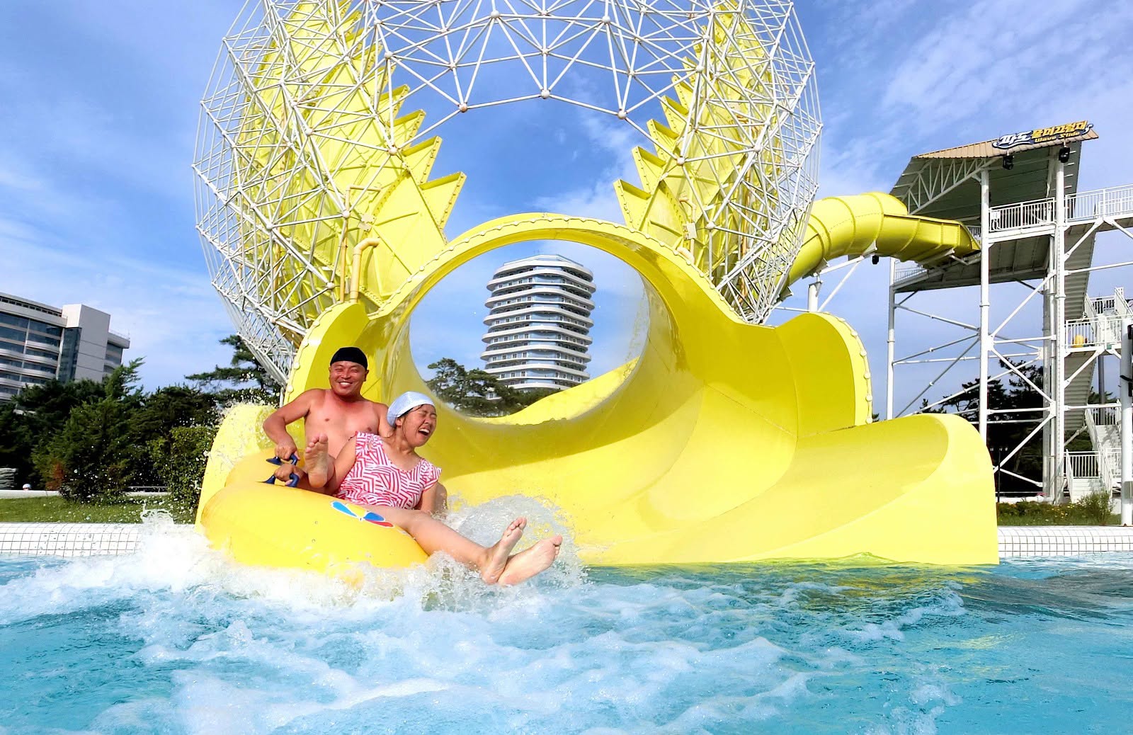 Visitors riding the Whirlwind Raft Combination at Myongsasimni Water Park