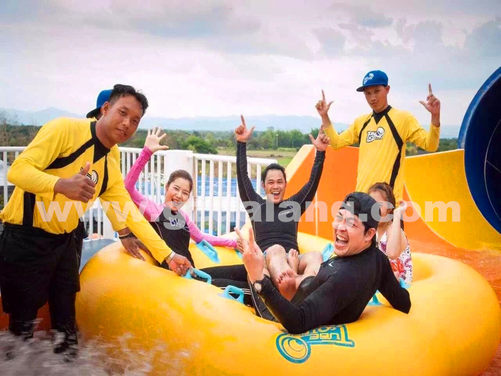 Visitors preparing to ride the large raft slide at Tube Trek Water Park