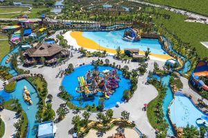 Aerial view of Taihu Dragon Dream Water Park with a wave pool, slides, and family water-play areas